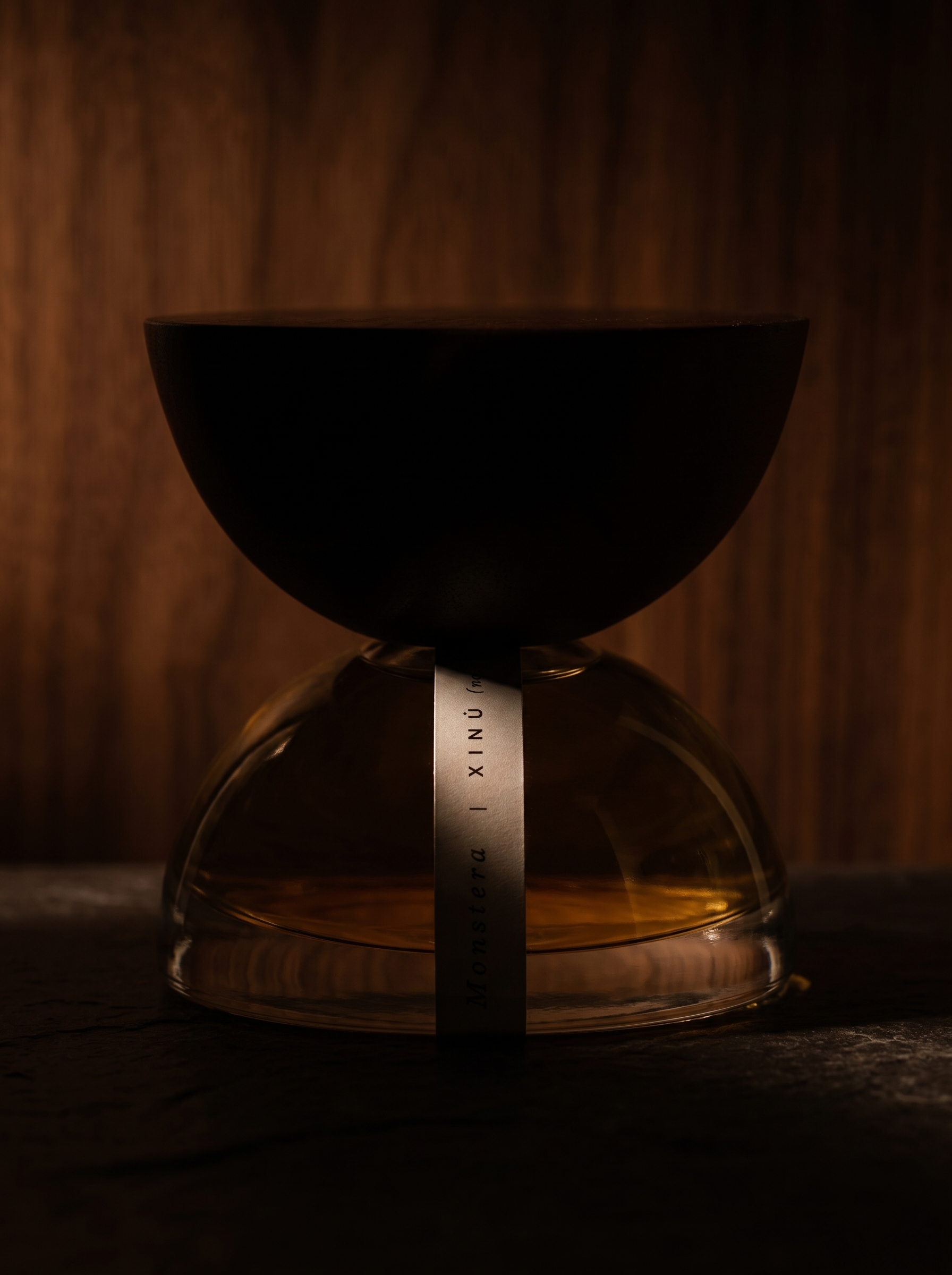Xinu perfume bottle with wood and natural texture