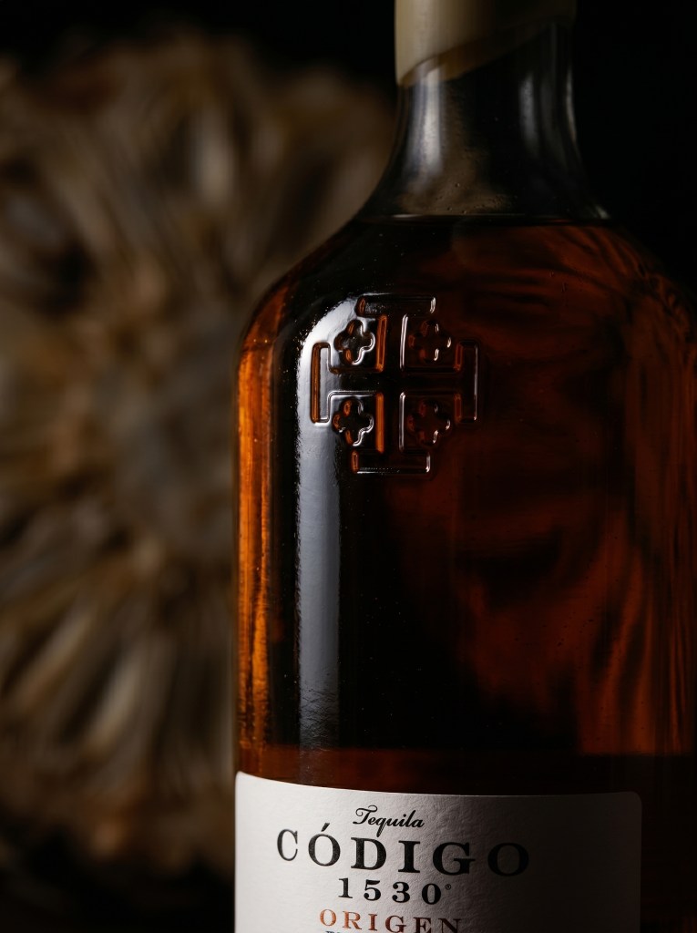 Código 1530 tequila bottle with shadow play